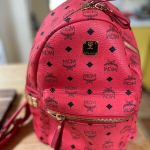 MCM Red Backpack with Iconic Design and Leather Finish